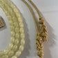 Traditionele sieraden - Kralenketting crème